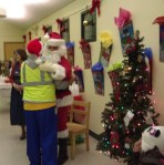 Santa give Joe a hug