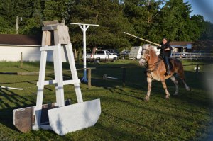Melinda and Mikie take a practice shot