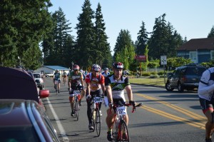Cars of friends and family awaited their cyclists at Spanaway Middle School